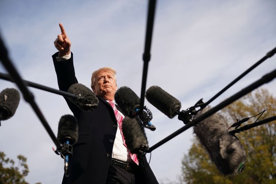 Trump talks to reporters as he departs the White House on Nov. 21