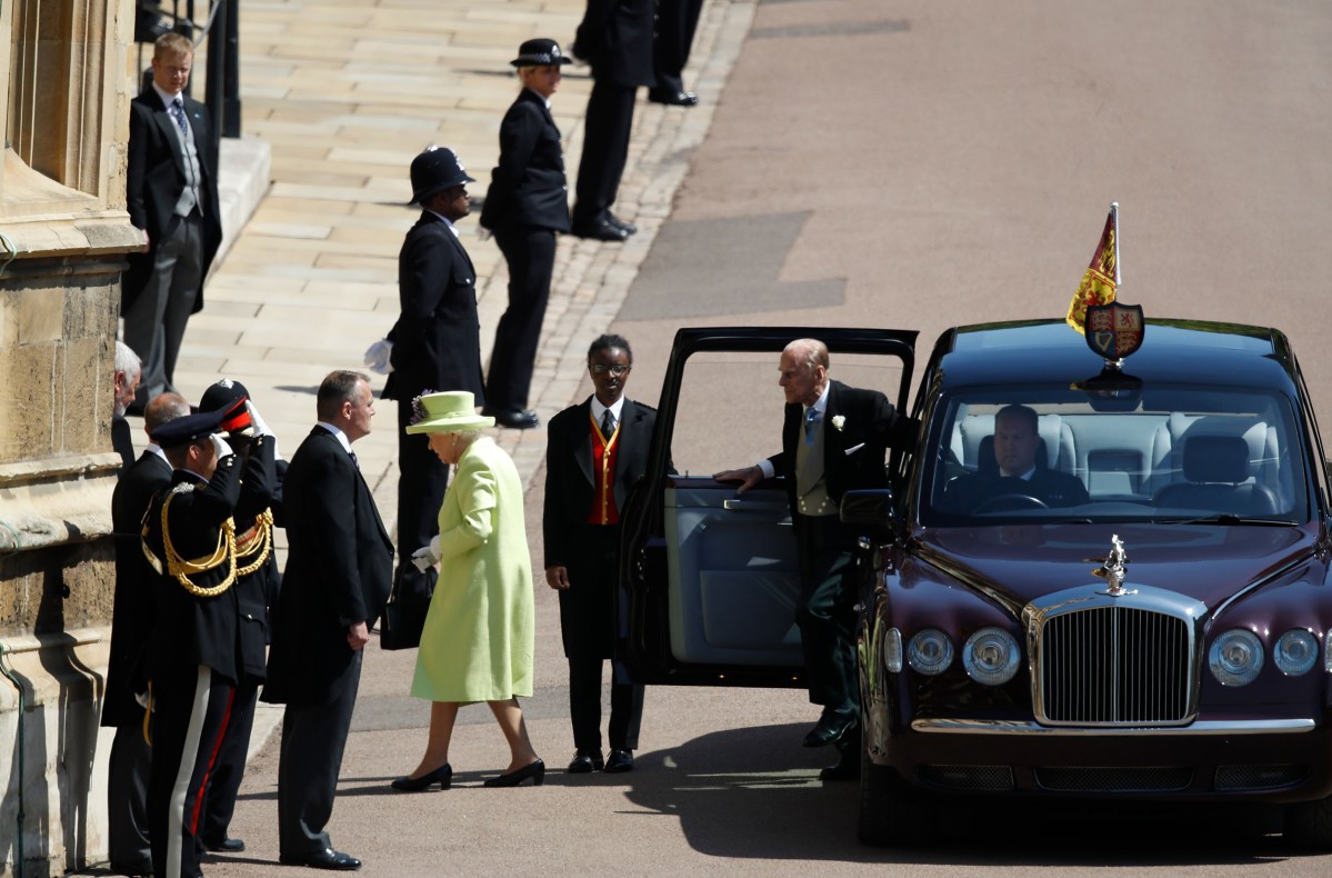 Queen Elizabeth II and Prince Philip, Duke of Edinburgh arrive at St George's Chapel, Windsor Castle, in Windsor, on May 19, 2018.