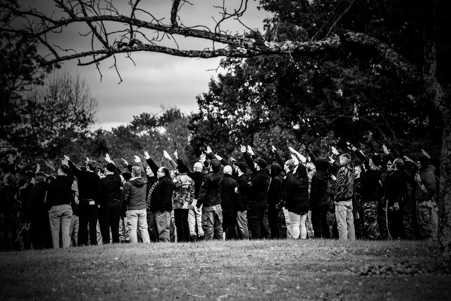 National Socialist Movement members give the nazi salute on a hill in Henry Horton Park in Chapel Hill, Tenn. on Oct. 28, 2017.