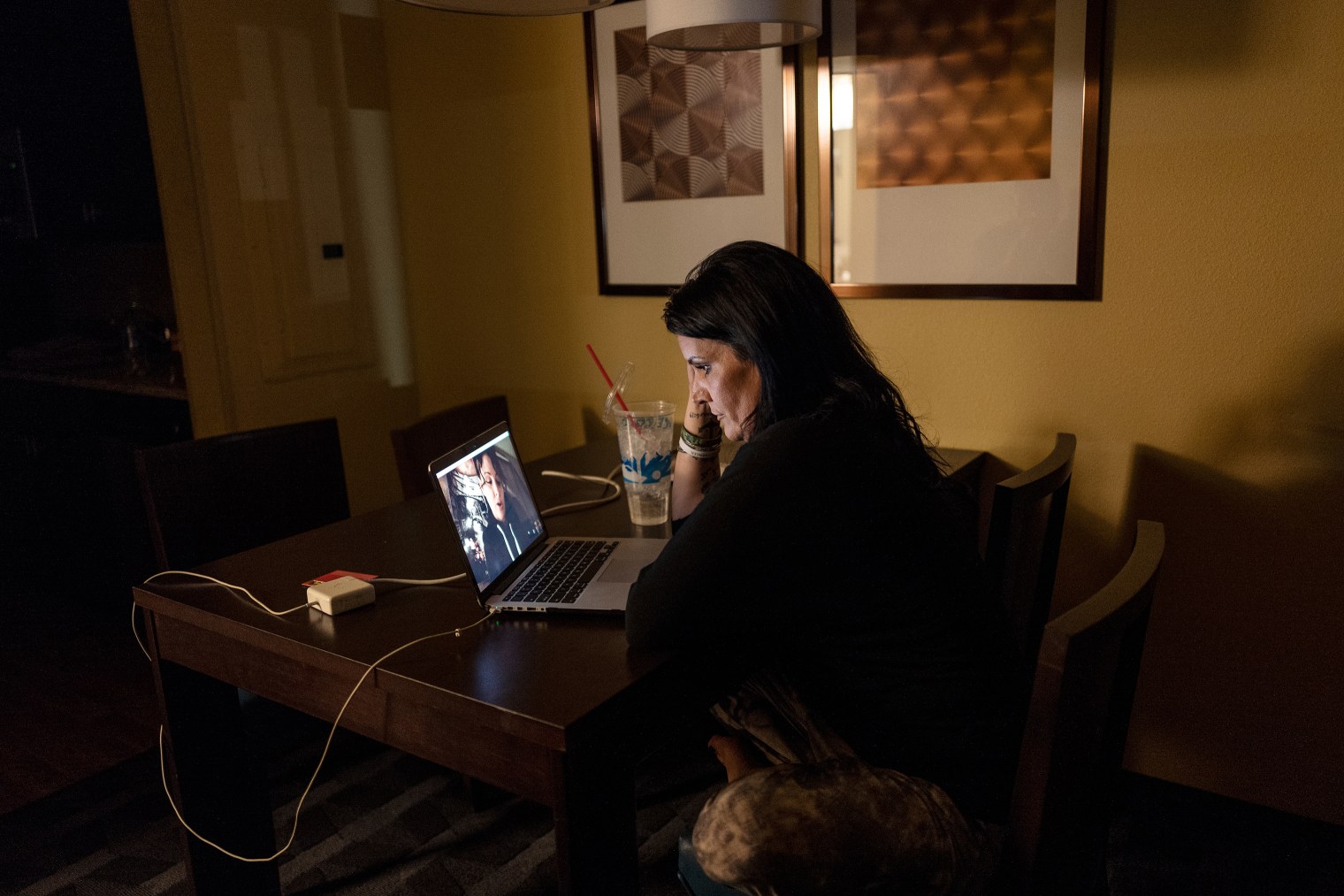 Lazenko speaks with Adale, who is in Utah, over Skype while offering her some remote support from Windie's hotel room in North Dakota, April 25, 2018