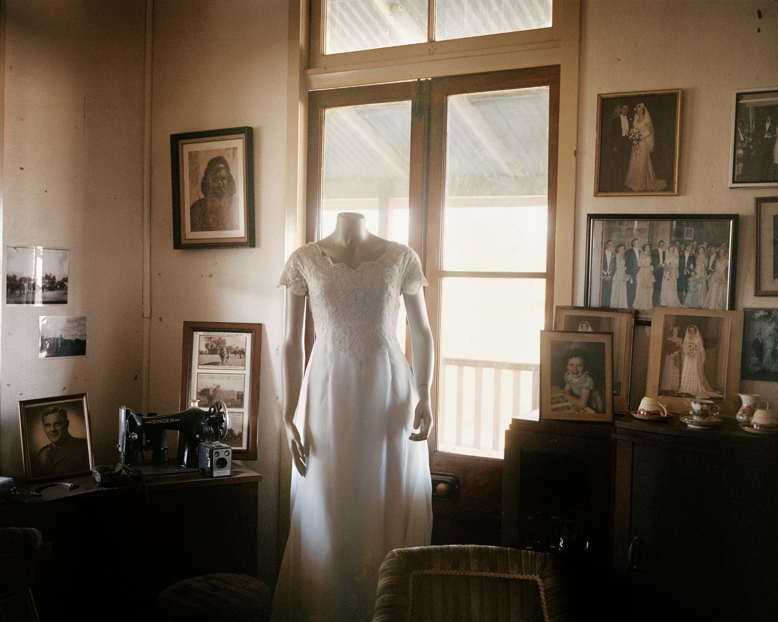 The wedding dress of Robyn Russell, 72, at her home on Charlotte Plains in Queensland in November. Russell lives and works her 69,000-acre property alone after her husband died of a brain tumor in 2011. Due to the drought, she describes herself "sliding into debt." In 2001 she had 8,000 sheep but she has since destocked to a current 3,800. To supplement her farm income, she has established a tourism business on her property with historical tours and farm stays.