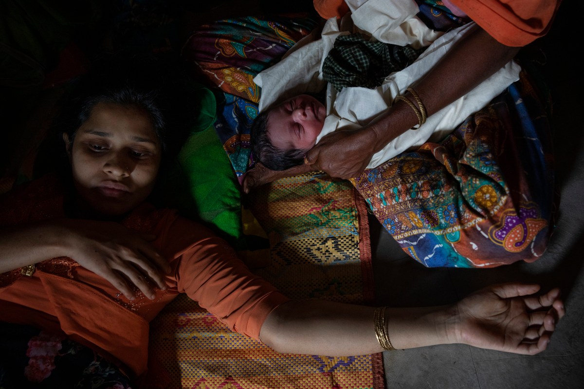 Umme Habiba, 18, following the birth of her daughter, Zahra.