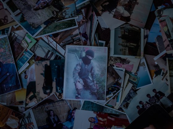 A photograph of Kamiran, as an ISIS fighter, among family pictures at his home.