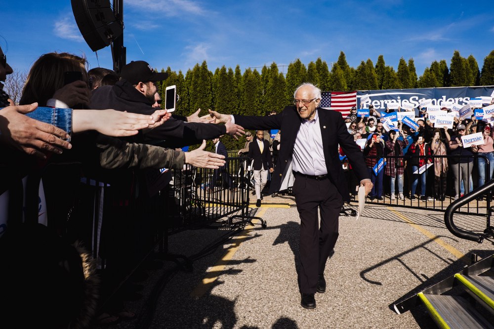 Senator Bernie Sanders greets supporters during a rally in Warren, Mich.