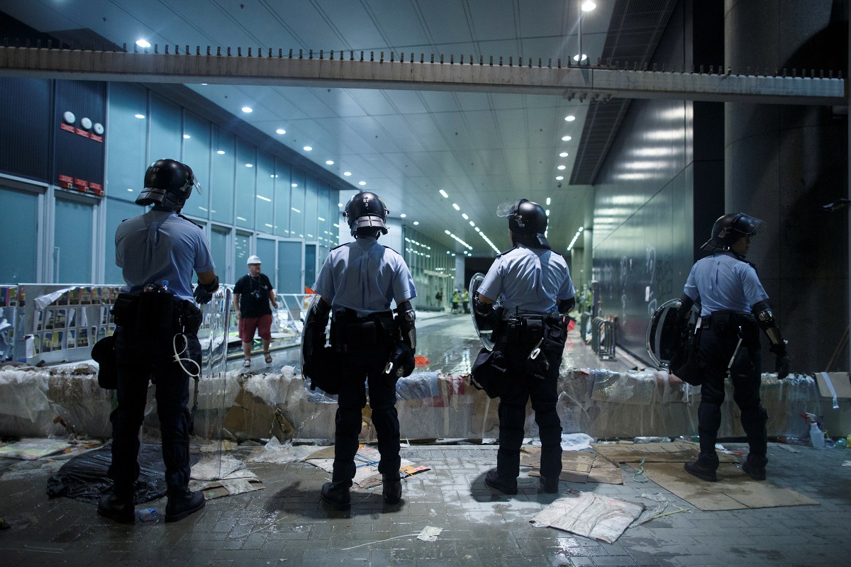 Riot police are positioned outside the Legislative Council building, after protesters stormed the complex on the anniversary of Hong Kong's handover to China, in Hong Kong on July 2, 2019.