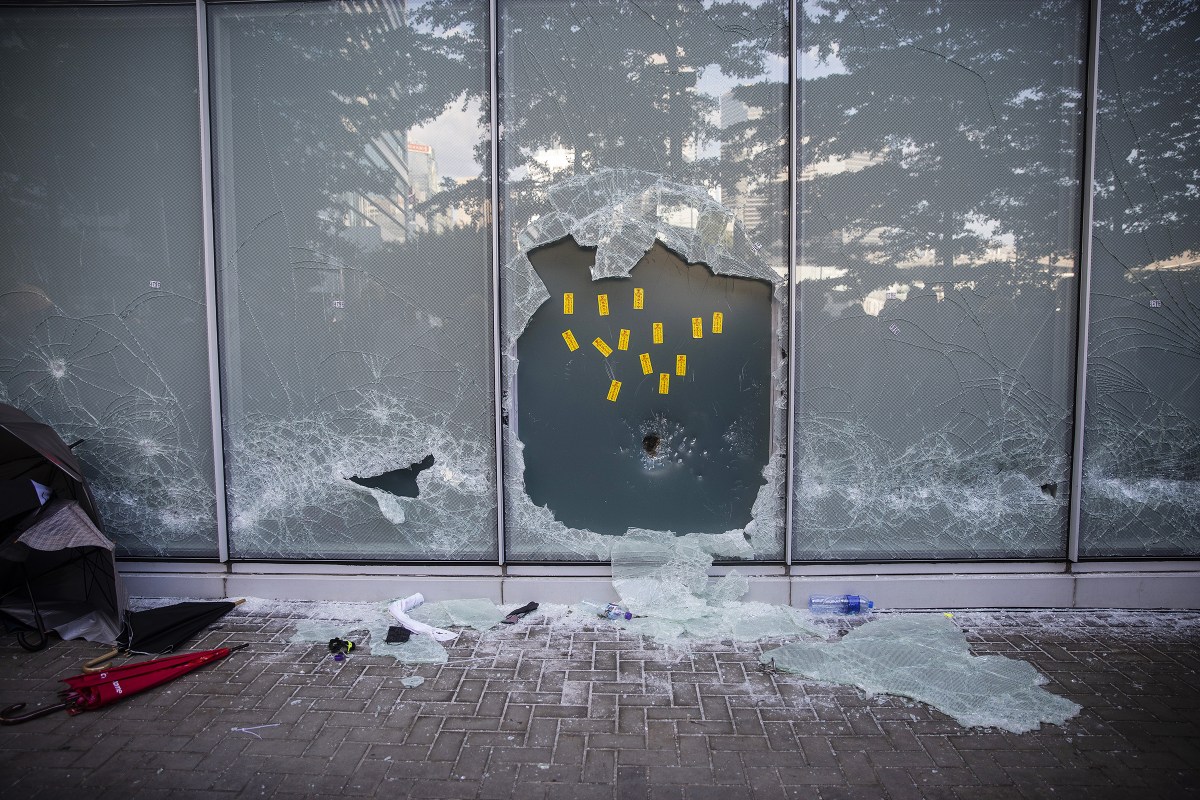 A broken window at the Legislative Council building during a protest in Hong Kong on July 1, 2019.