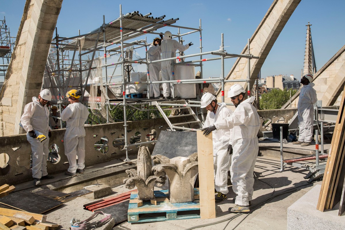 Florets are removed from Notre DameÃ•s pinnacles, so a wooden arch can be installed to support a flying buttress, on JulyÃŠ2, 2019.